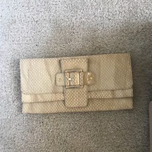Stuart Weitzman nude snake clutch